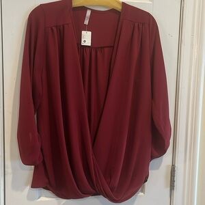 NWT! Women’s Burgundy/Wine Top
Size: Medium